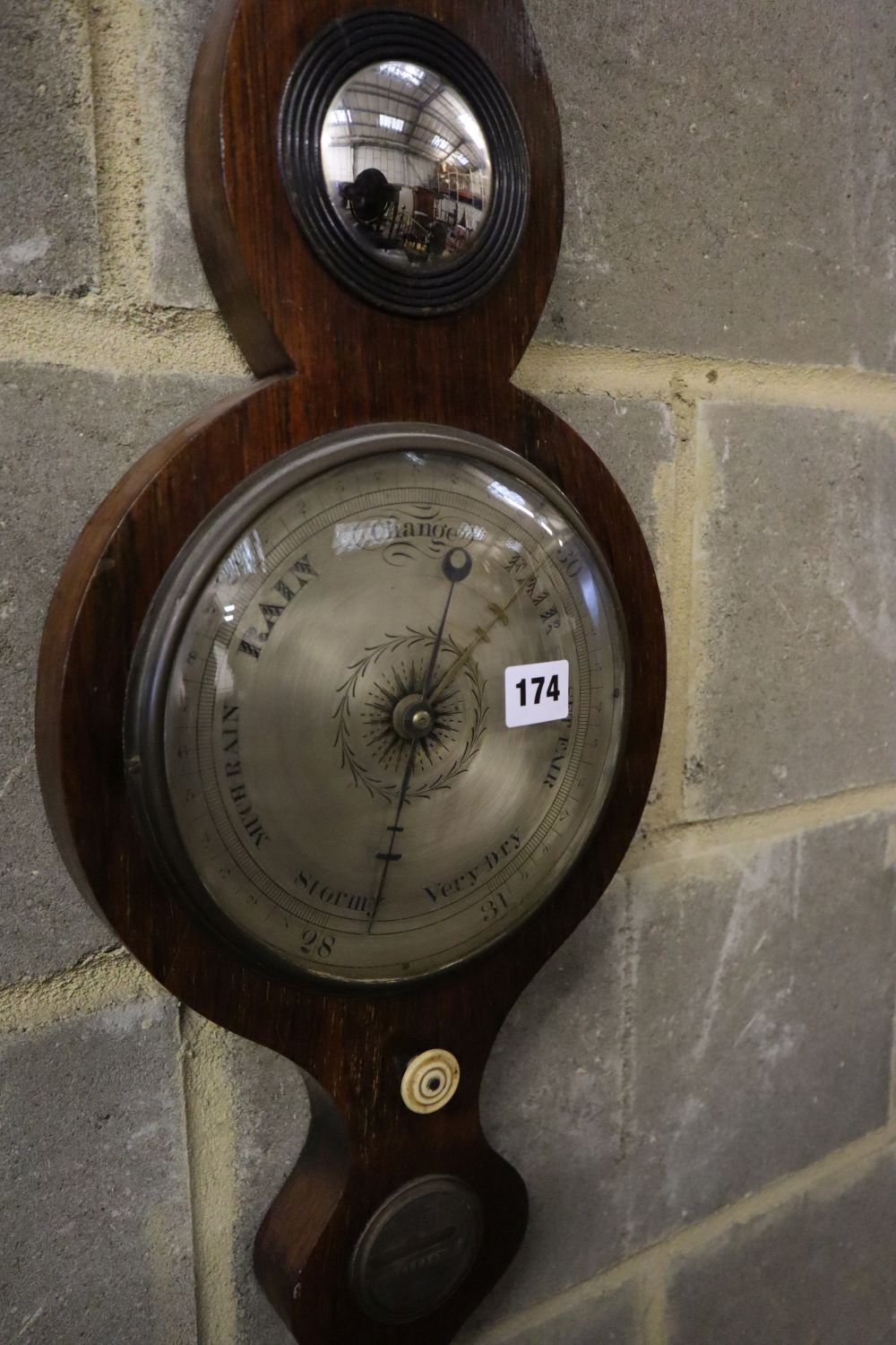 A William IV Irish rosewood wheel barometer, marked Riddel & Co., Belfast